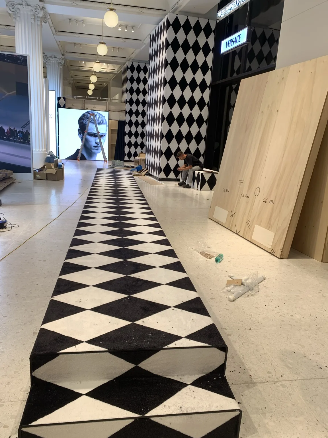 Raised carpet-wrapped catwalk